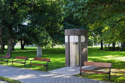 Modern automatic self cleaning, pay for use public toilet in the Park