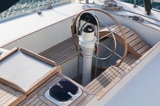 Steer and compass on sailing boat