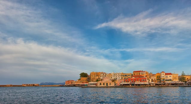 CHANIA, GREECE - MARCH 3: The old Venetian harbour at sunset on March 3, 2010 in Chania, Crete Island, Greece.