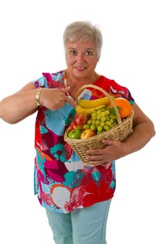 Senior woman with fresh fruit isolated on white background