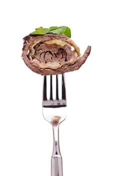 Beef roulade with parsley on a fork