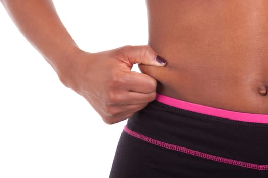 Belly of a young sexy african american woman, isolated on white background