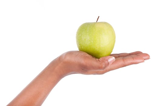 African American woman holding a fresh apple in her hand,isolated on white background