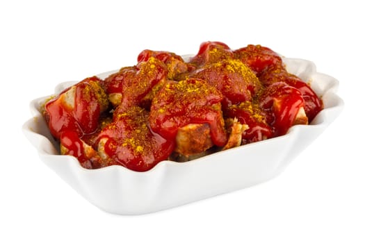 Currywurst in ceramic bowl