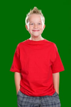happy boy in front of green background