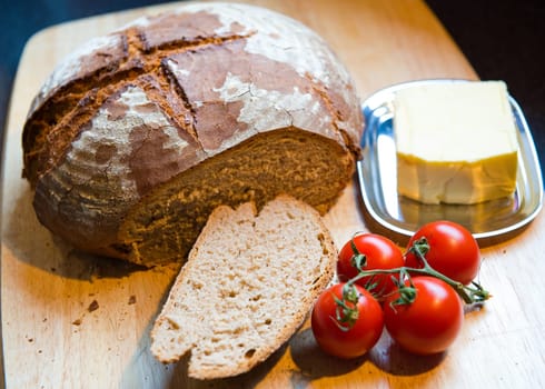 fresh farmhouse bread with butter and tomato