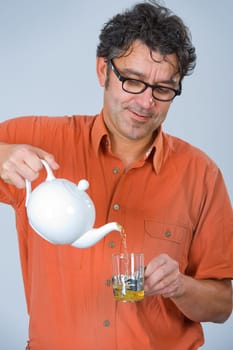 man is drinking tea