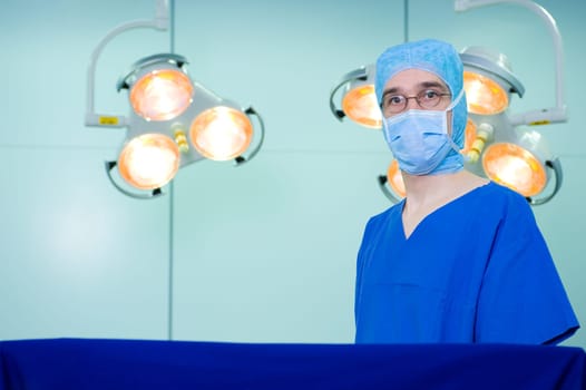 doctor with bonnet and surgical mask