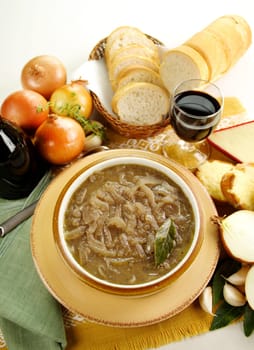 French onion soup with cheese and cheddar rounds ready to serve.
