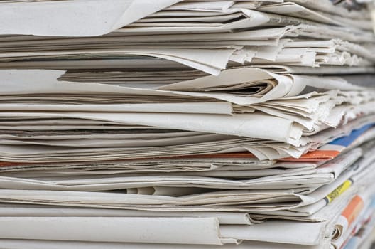 Close-up of a stack of newspapers