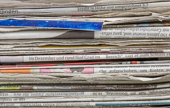 Close-up of a stack of newspapers