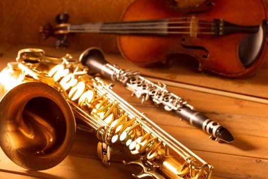Classic music Sax tenor saxophone violin and clarinet in vintage wood background