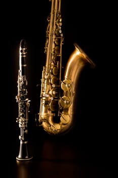 Classic music Sax tenor saxophone and clarinet in black background