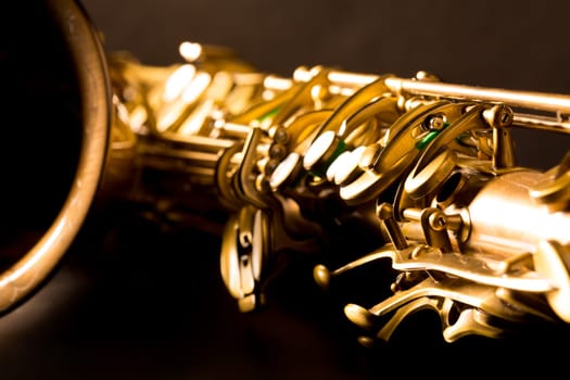 Tenor sax golden saxophone macro with selective focus on black