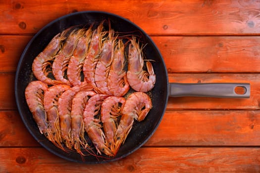 grilled shrimp seafood in round pan in a row