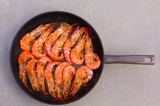 grilled shrimp seafood in round pan in a row