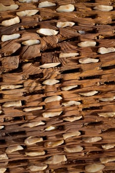 threshing board for wheat of aged wood and stones texture vintage pattern