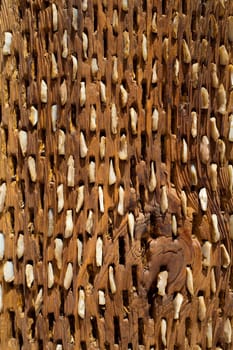 threshing board for wheat of aged wood and stones texture vintage pattern