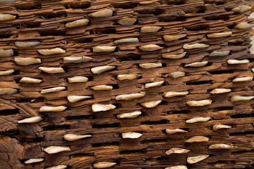 threshing board for wheat of aged wood and stones texture vintage pattern