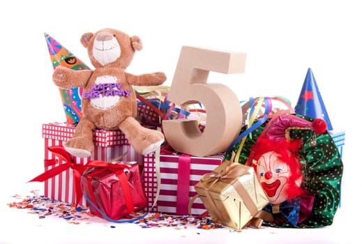 Number of age in a colorful studio setting with a red heart and gifts and tulips
