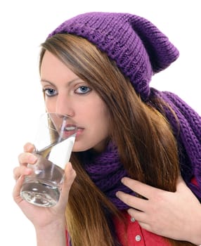 Close-up of sick pretty girl drinking water from glass