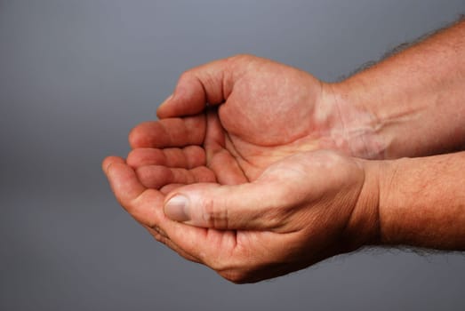 two male hands bilding a gesture of emptyness, copy space