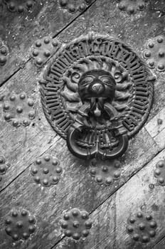 Door Knocker on the door of an old building