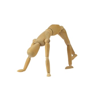 Wooden female figure is doing handstand