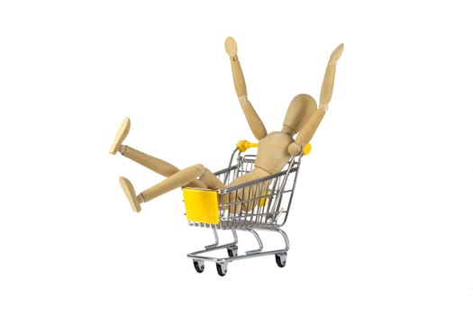 A happy wooden female doll in a shopping cart
