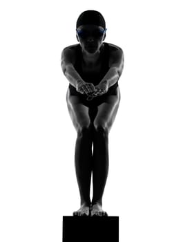 one caucasian woman competition swimmer on starting in silhouette studio isolated on white background
