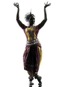 one indian woman dancer dancing in silhouette studio isolated on white background