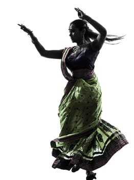 one indian woman dancer dancing in silhouette studio isolated on white background