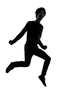 one african handsome young man jumping screaming  in silhouette studio isolated on white background