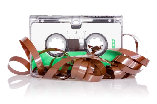 Audio Cassette  With Pulled Out Tape. Isolated on white background