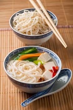 Chinese soup with tofu, vegetables and noodles