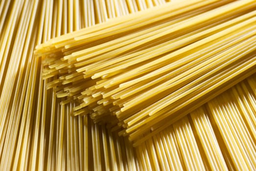 fresh uncooked spaghetti background close up shoot