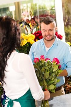 Husband buying roses bouquet romantic flower market florist