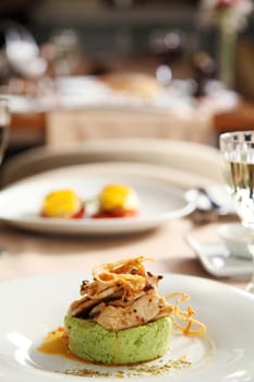 Roasted chicken with green puree in luxury restaurant