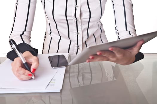 Businesswoman holding digital tablet