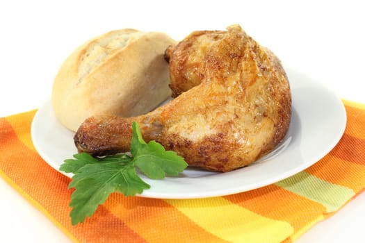 a grilled chicken thigh against a white background