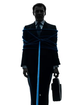one caucasian business man tied up prisoner  in silhouette studio isolated on white background