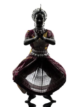 one indian woman dancer dancing in silhouette studio isolated on white background