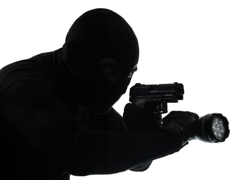 thief criminal terrorist in silhouette studio isolated on white background