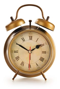 Old alarm clock isolated on white background