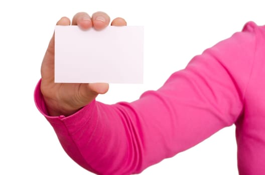 Female hand with magenta sweater holding a blank business card