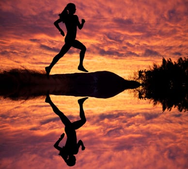 Female runner silhouette against the sunset