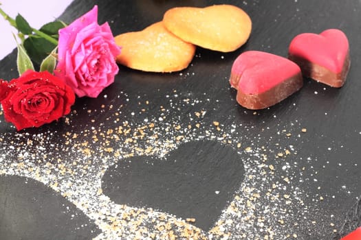 Dessert valentines day dish served on black slate