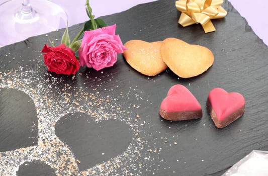 Dessert valentines day dish served on black slate