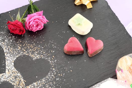 Dessert valentines day dish served on black slate