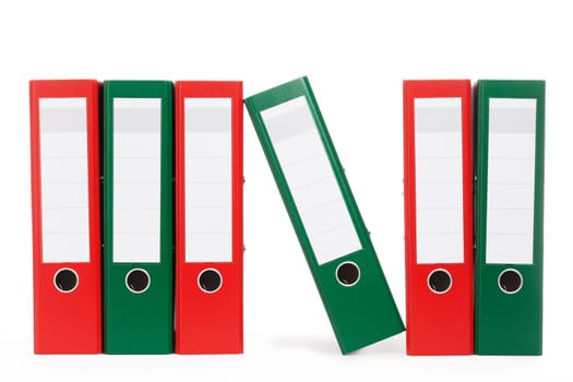 Ring binder,one leaning,in a row on white background